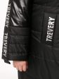 Молодежное дутое пальто с силиконовыми лентами и блестящей плащевкой, цвет черный в интернет-магазине Фабрики Тревери