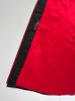 Женское зимнее пальто из комбинированной стеганой ткани черного цвета и красной отделкой, цвет черный в интернет-магазине Фабрики Тревери